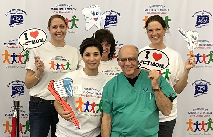 Group of dental team members at community event