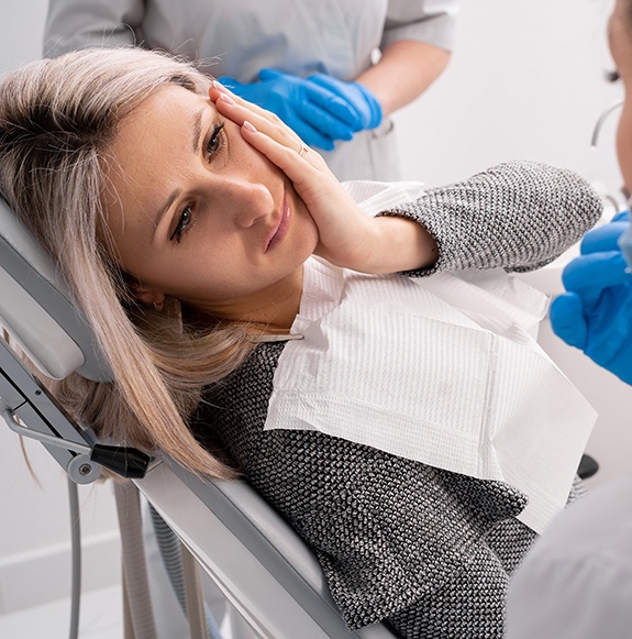 Woman at the dentist with a toothache